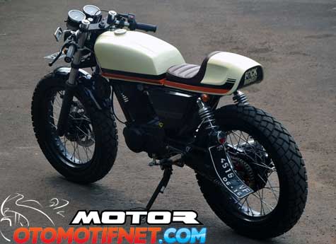 Foto Modifikasi Honda Megapro konsep Cafe Racer shockbreaker menggunakan Yamaha Byson setang jepit kustom tangki serta buntut dibuat pakai plat glavanis joknya dibuat single seater kaki-kaki pakai pelek gambot berdiameter 18