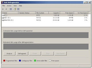 Menggunakan disk defragmenter untuk mengatur file di hardisk