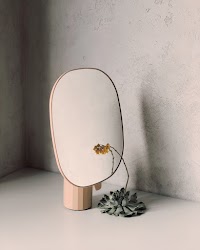 Yellow Petaled Flower Beside Mirror