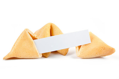 3 fortune cookies with a blank paper inside