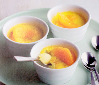 Baked Cardamom and Orange Custards: Individual custards flavoured with cardamom and orange served topped with orange segments