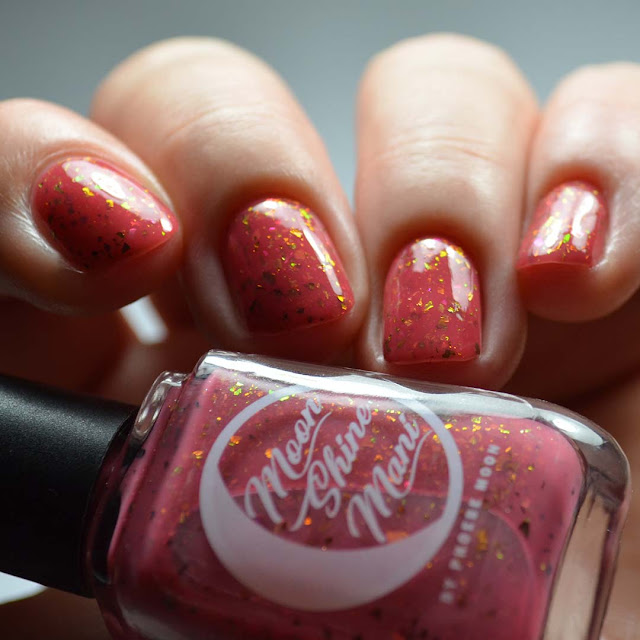 rose red nail polish with color shifting flakies