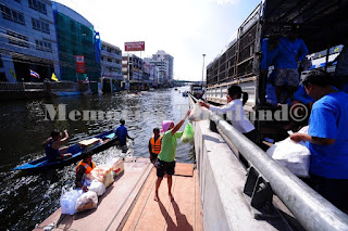 Many people needs food and water to survive with the terrible flood in 2011, Thailand