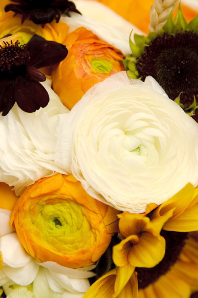 with orange ranunculus berries and wheat Love this detail of the bouquet