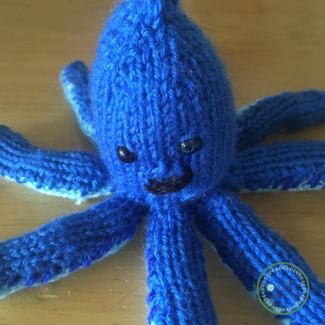 Picture of close up of knitted octopus soft toy