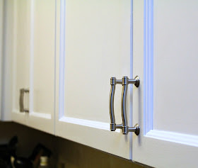 nickel plated nautical cabinet handle on white door