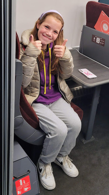 Keilyn in her First Class seat