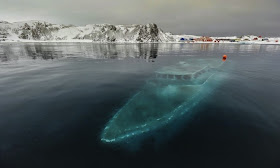 Sunken yacht, Antarctica - 30 Abandoned Places that Look Truly Beautiful