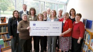 The Harford County Public Library (HCPL) Foundation and the Bel Air Friends of HCPL each donated $10,000 to kick off the Early Literacy Interactive Space Campaign on October 20th. Left to right: Anita A. Brightman, Terry O. Hanley, Leslie Riden, Beth LaPenotiere, Mari Kane, Annie Kovach, Richard Kinard, Mary Hastler, Carolyn Lambdin, Kathy Whitehead, Linda VanDeusen and Terry Troy