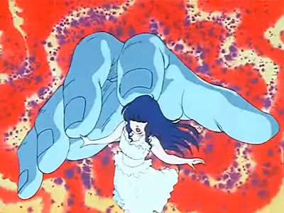 Minmay is kidnapped. In a nightmare, hence the giant hand.