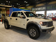 Ford F150 Raptor. It has an off road tuned suspension and a 6.2 liter V8 .