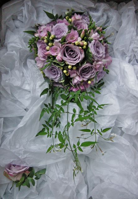 Amy's vintage bouquet of mauve and lilac roses with freesias 