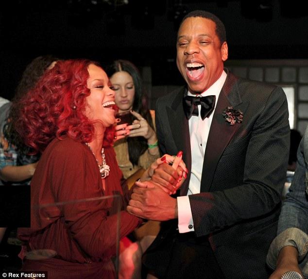 beyonce red hair rihanna. Having a ball: Rihanna looked