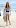 Bella Thorne in a bikini top and denim shorts on Malibu beach