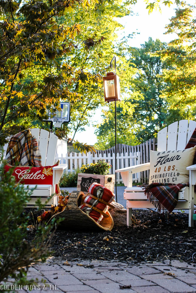 Adirondack chairs with plaid blankets and outdoor fall decor ideas