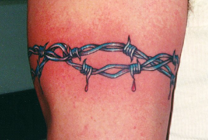 barbed wire tattoo designs. Barbed Wire Tattoos