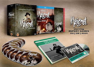 Opened box set showing discs and booklets