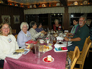 Judi Betts (center) had us all take our sketchbooks and paint our dinner or .