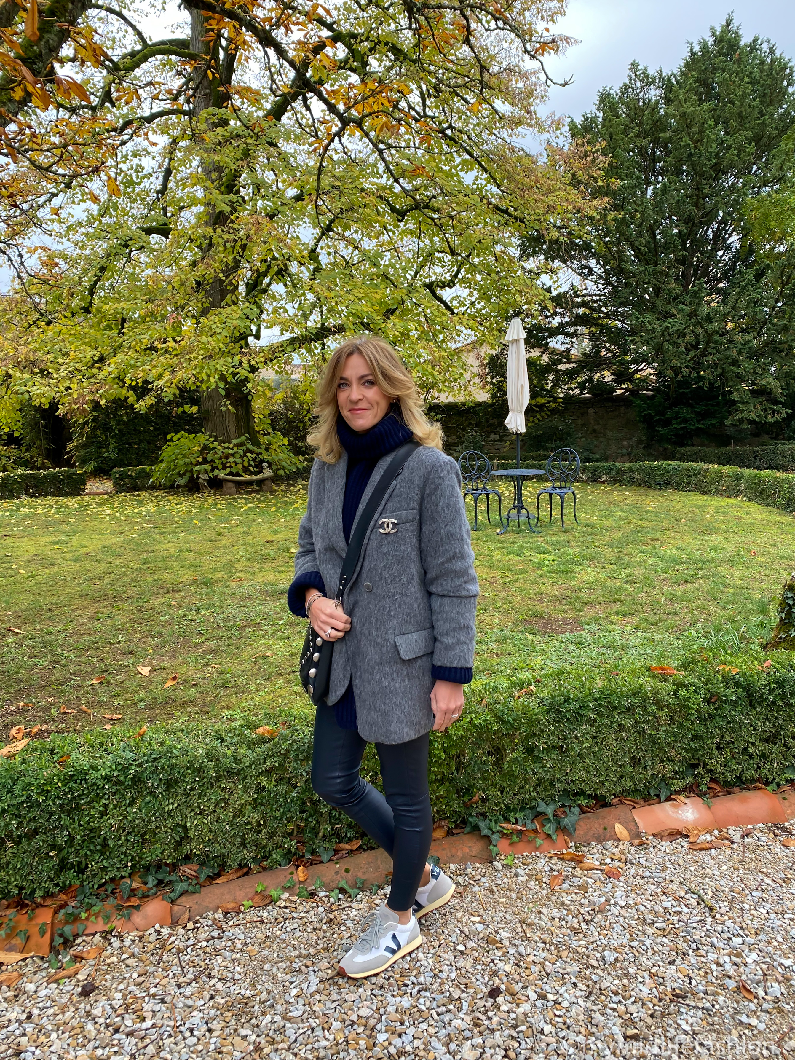 my midlife fashion, Isabel Marant studded leather bag, h and m oversized blazer, acne studios wool oversized jumper, Chanel brooch, uterque leather leggings, veja trainers