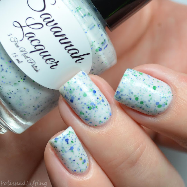 white crelly nail polish with glitter