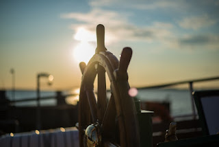 Steering Wheel photo by orbtal media via Unsplash - https://unsplash.com/photos/Esq0ovRY-Zs