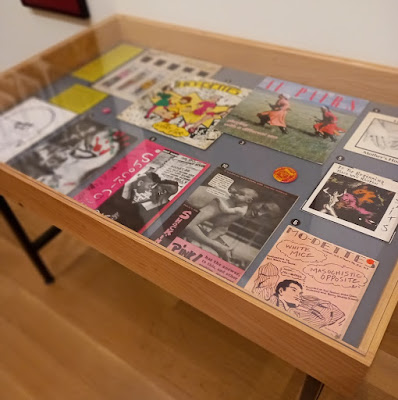 Display cabinet with punk and post-punk picture sleeves.