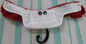 Sweet Nothings Crochet free crochet pattern blog, photo of the little Minnie mouse skirt diaper showing the inside diaper holder