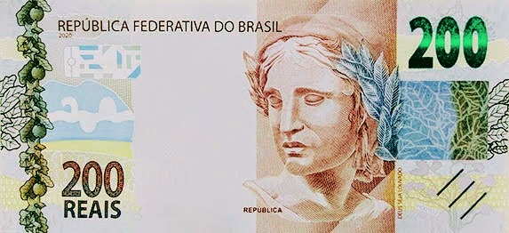 A foto mostra uma Cédula de Duzentos Reais (R$ 200) que está corroído pela o dólar americano  e a inflação nas alturas.