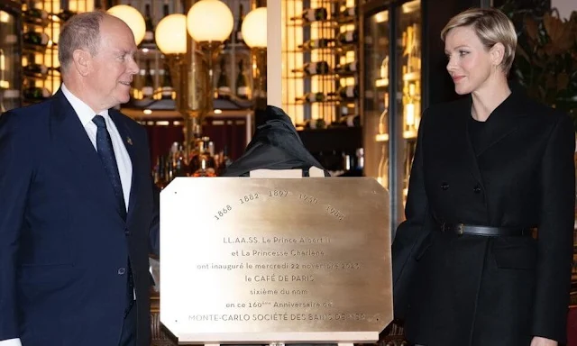 Princess Charlene wore a new black camel hair wool jacket by Burberry. Marie Ducruet and Camille Gottlieb