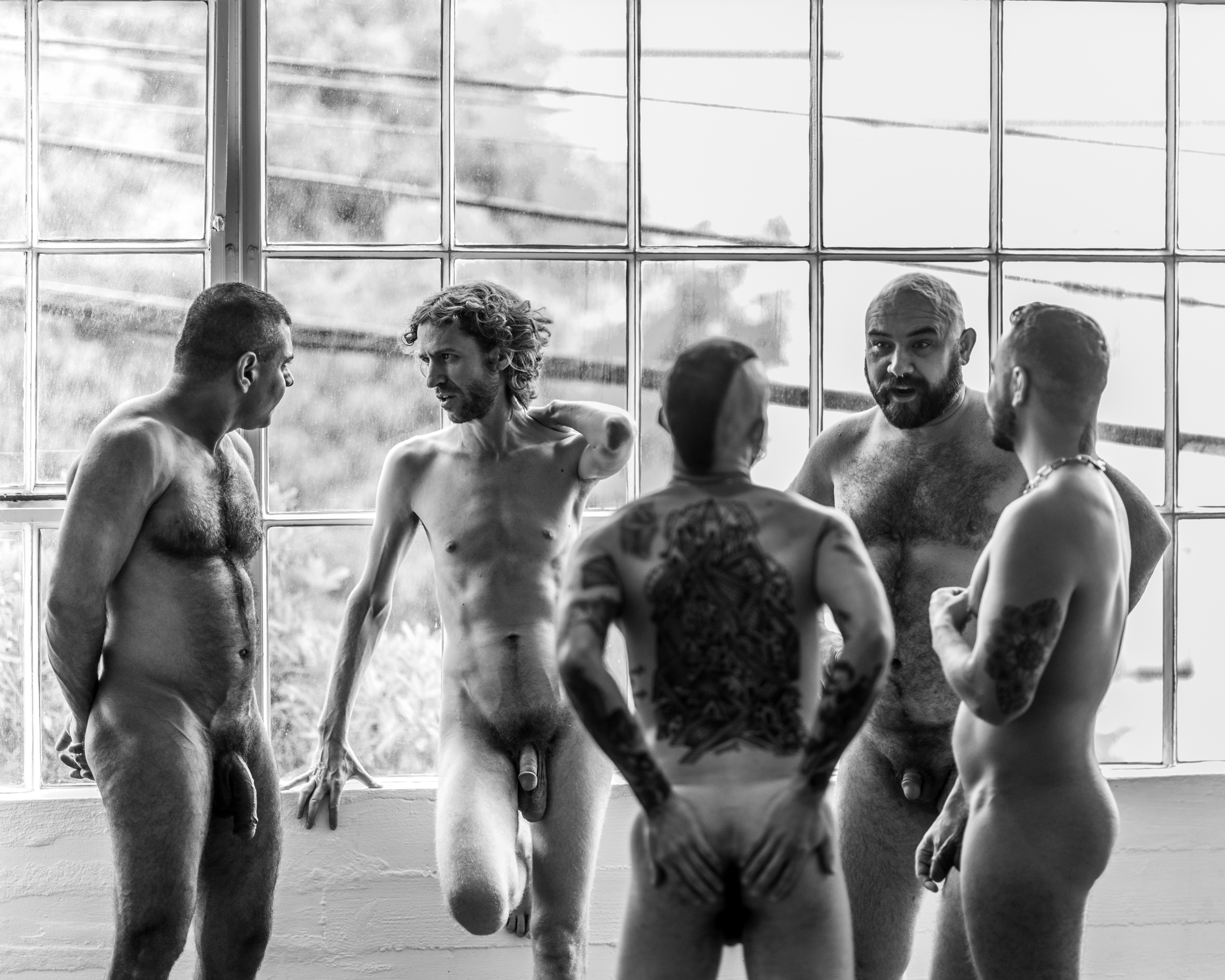 Naked men hanging out