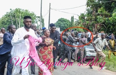 IN PICTURES: Gov Amosun fights mob at Adeleke's burial, saves female politician from lynching