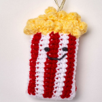 http://www.redheart.com/files/patterns/pdf/LW5746-Bag-of-Popcorn-Ornament-Free-Crochet-Pattern.pdf