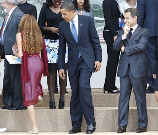 President Obama sneaks a peek [corrected] at a girl's ass