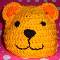 http://www.ravelry.com/patterns/library/wild-things---lion-and-bear-hats-us-terms