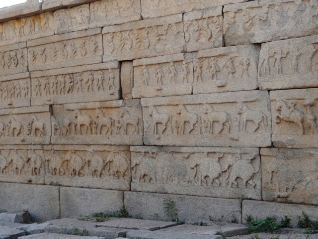 Exterior wall of Hazara Rama temple showing the Mahanavami procession - Hampi