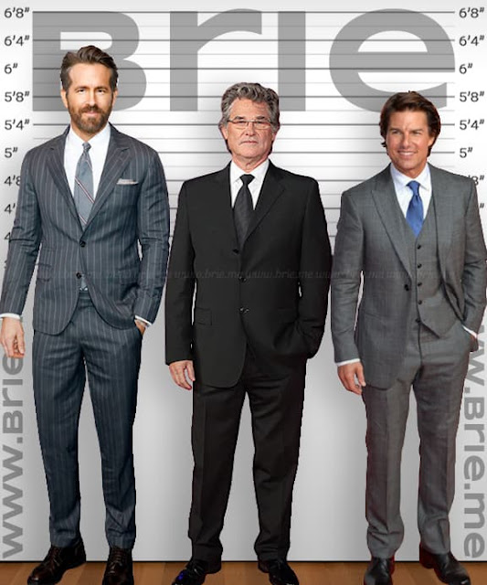 Kurt Russell standing with Ryan Reynolds and Tom Cruise