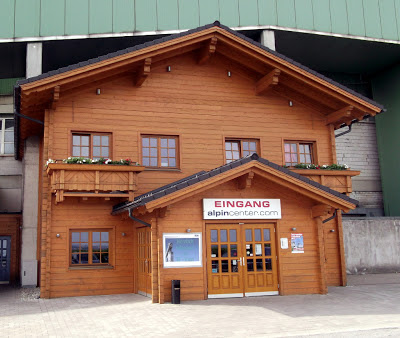 Image of the Alpine chalet entrance at the AlpinCenter Bottrop