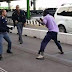 Photos of an African migrant resisting arrest...lol