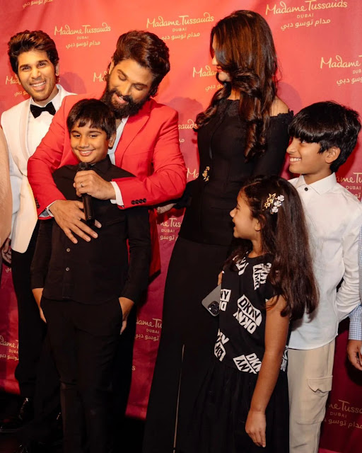 Allu Arjun & His Family With His Wax Statue Image