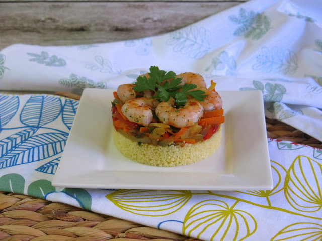 TIMBAL DE COUS COUS CON VERDURAS Y LANGOSTINOS