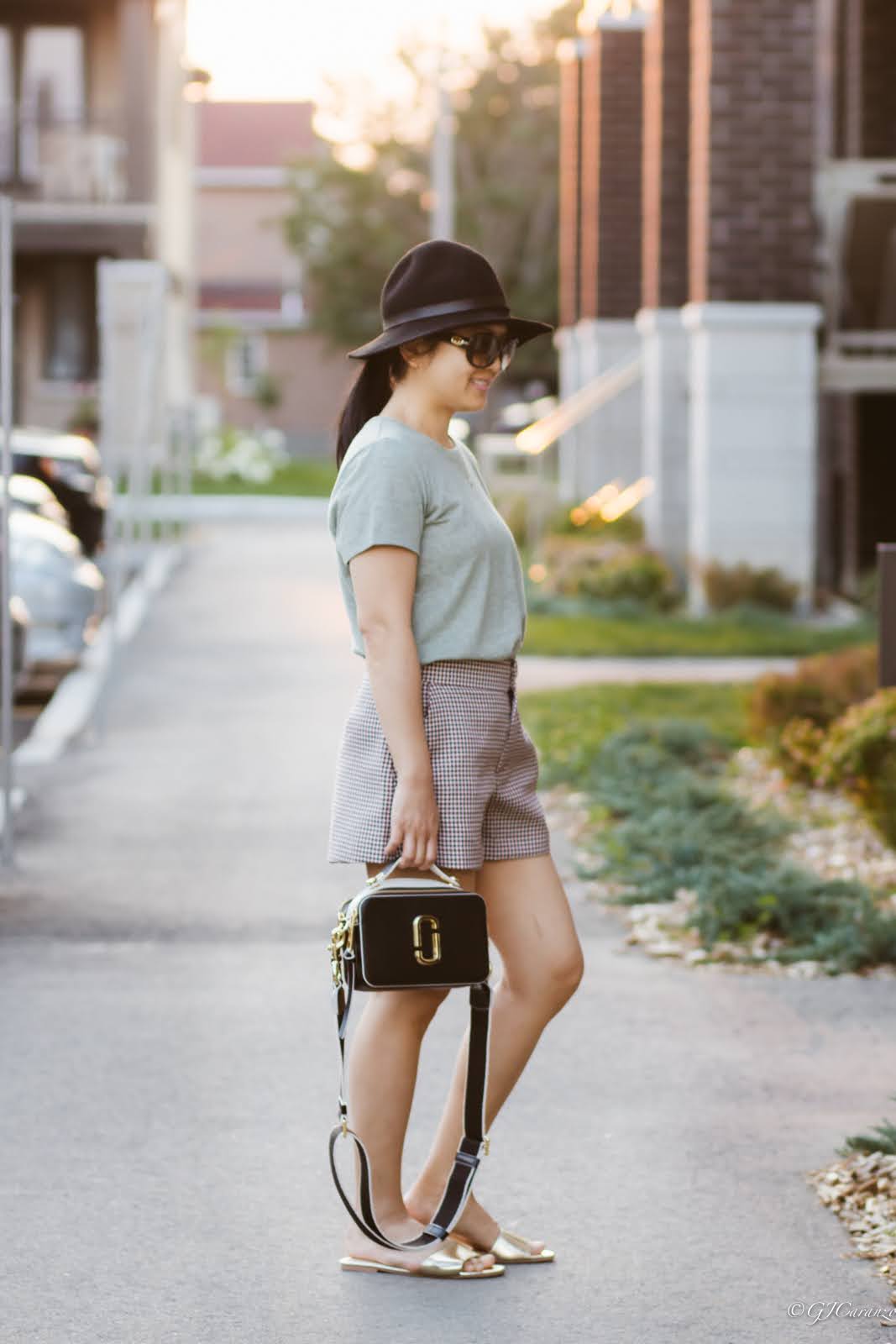 Zara plaid shorts_Walmart green t-shirt_Walmart slides_Marc Jacobs Sure Shot Bag_HM hat_Gucci Sunglasses | Petite Fashion