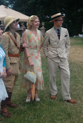 Young man in 1920s safari costume with other 1920 outfits at the Roaring Twenties Lawn Party in Boston's North Shore