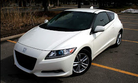 Front 3/4 view of white 2011 Honda CR-Z parked