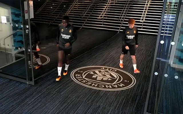 Fans confused at Real Madrid players AVOID stepping on Man City's crest