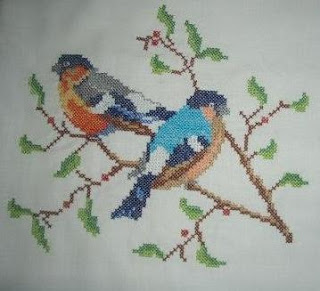 This is a cross stitch machine embroidery design that I made for a top