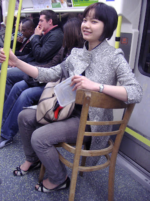 sitting on seatless chair