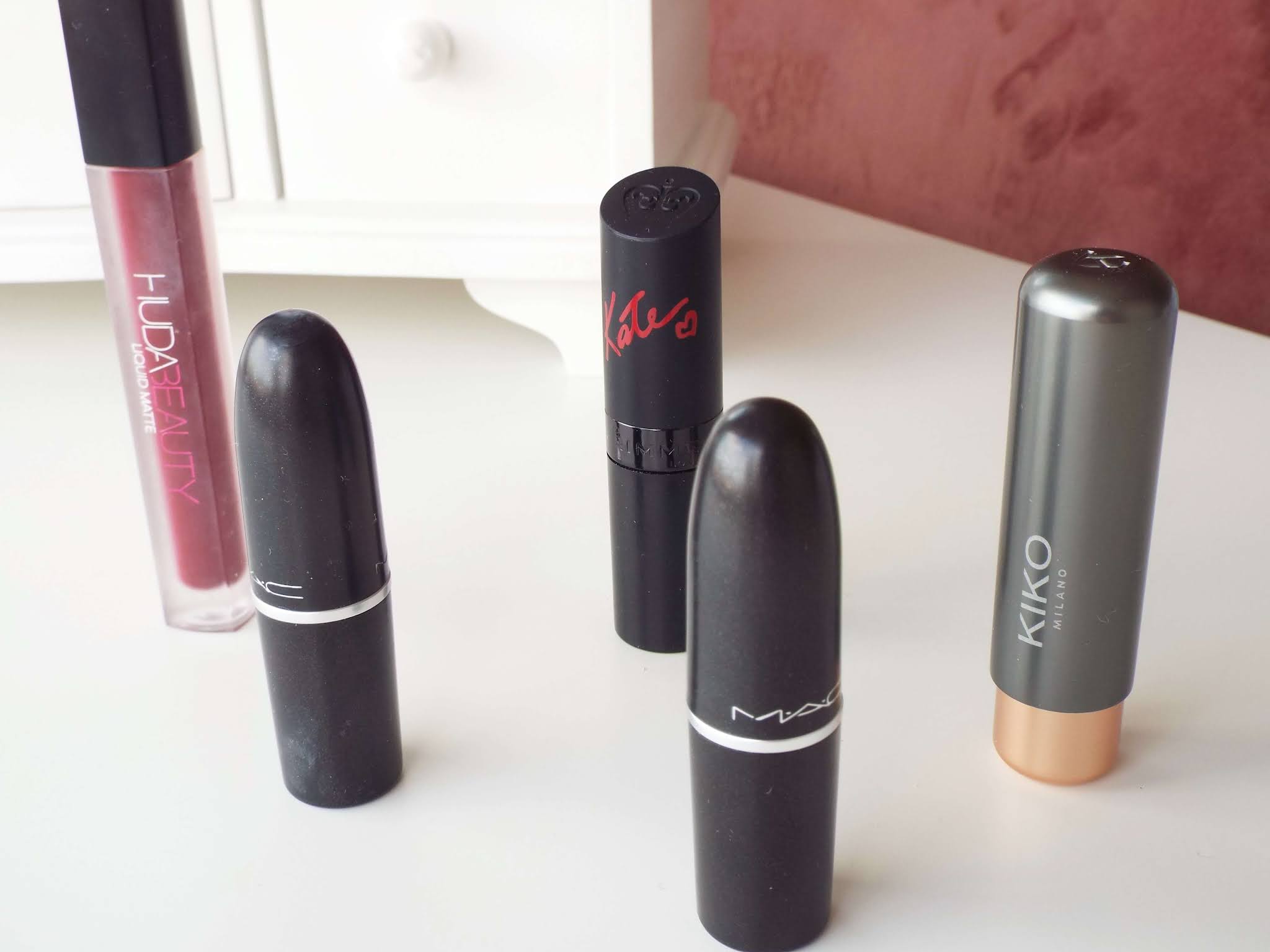 The five lipsticks, Huda Beauty, MAC, Rimmel and Kiko lined up together.