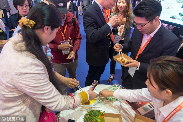 Chinese man invents smart robot cooker because of his wife's inability to cook