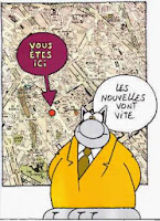 dessin du Chat de Geluck devant un panneau indicateur vous êtes ici