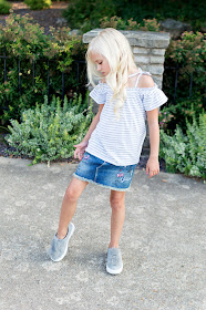 little girl fashion outfit denim skirt patches fur pom shoes sneakers off the shoulder